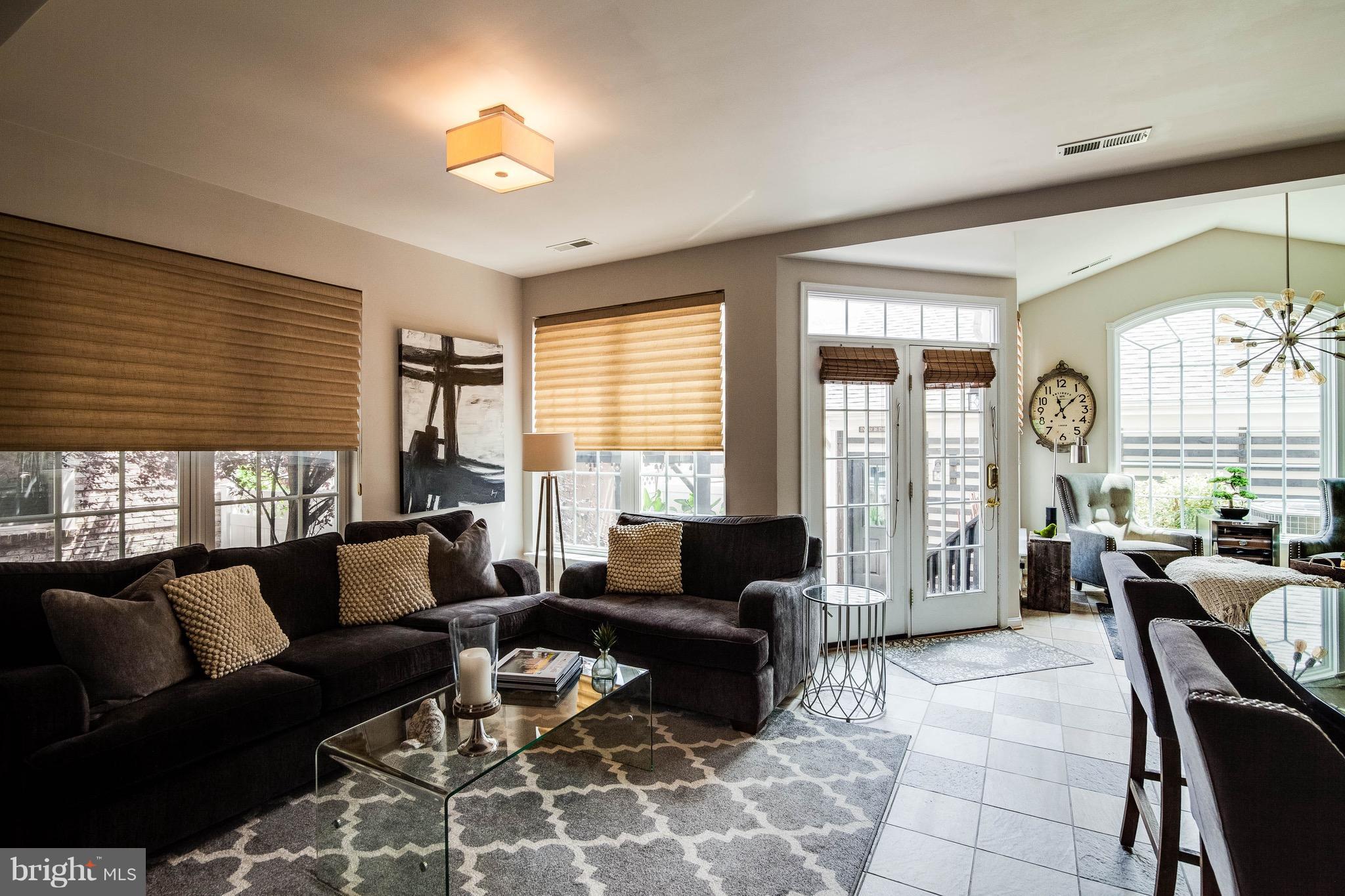 22960 Fanshaw Square Ashburn, VA 20148 - Photo 8 of 30 a living room with furniture and a large window