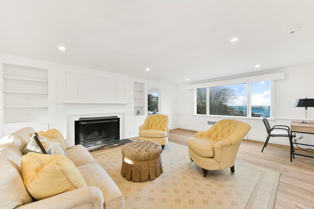 15 White Head Road Cohasset, MA 02025 - Photo 13 of 19 a living room with furniture and a fireplace
