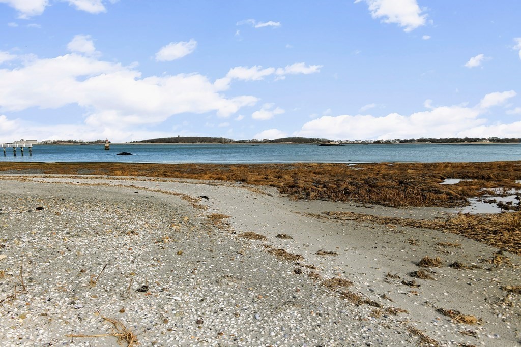 15 White Head Road Cohasset, MA 02025 - Photo 7 of 19 a view of an ocean and beach
