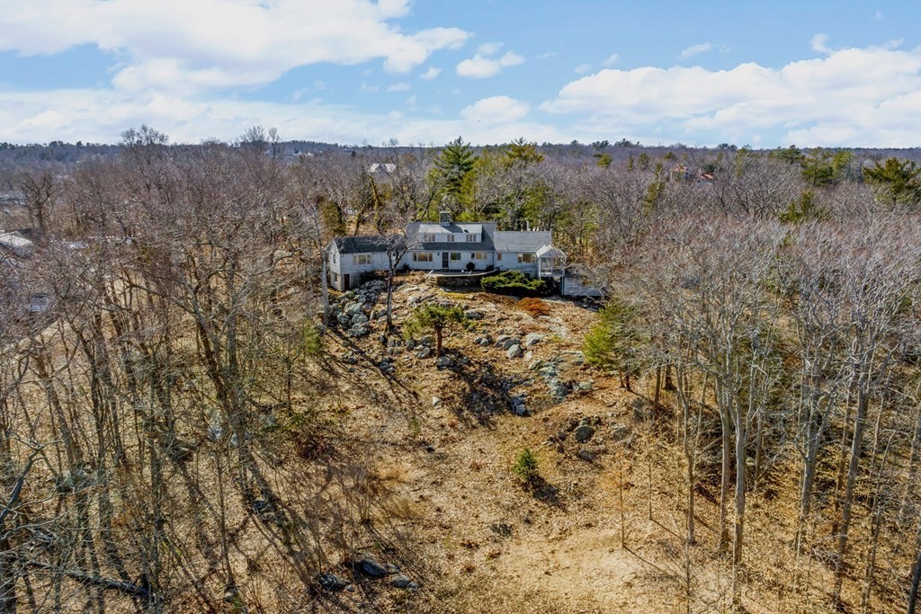 15 White Head Road Cohasset, MA 02025 - Photo 9 of 19 a view of a city with lush green forest