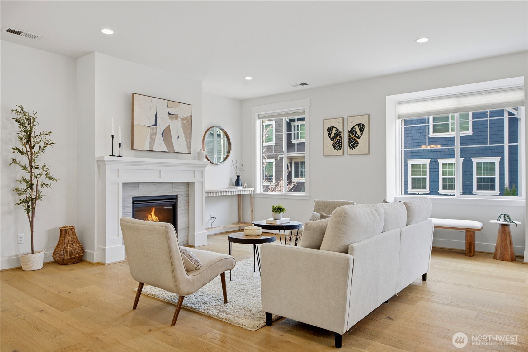 18615 46th Avenue Southeast Bothell, WA 98012 - Photo 13 of 37 a living room with furniture and a fireplace