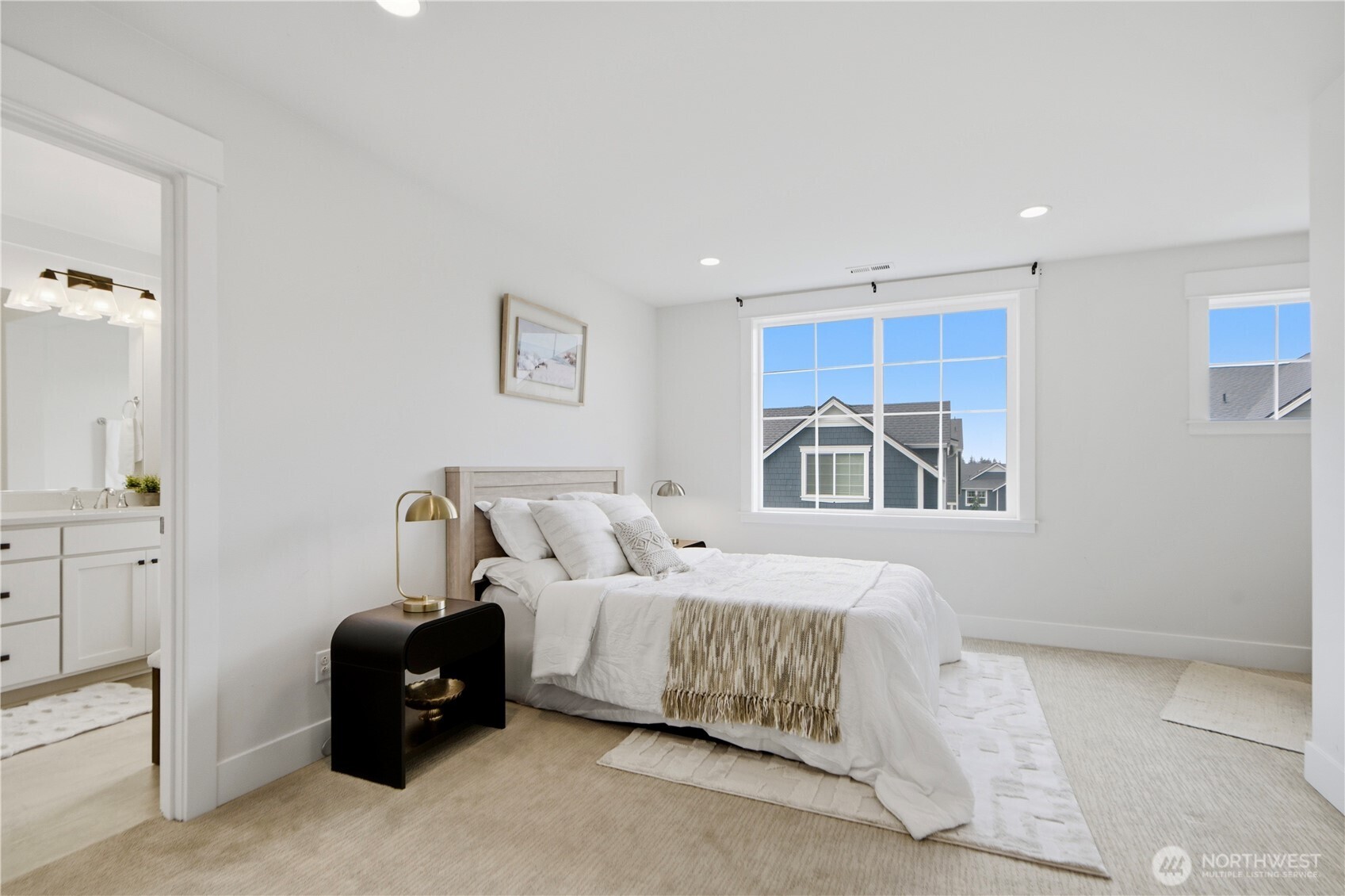 18615 46th Avenue Southeast Bothell, WA 98012 - Photo 20 of 37 a bedroom with a bed and a lamp