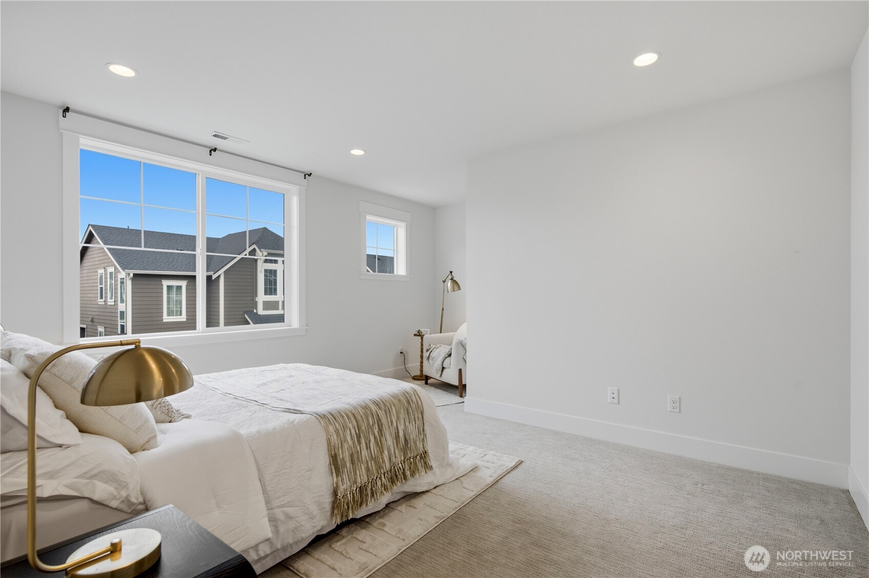 18615 46th Avenue Southeast Bothell, WA 98012 - Photo 21 of 37 a bedroom with a bed and a window