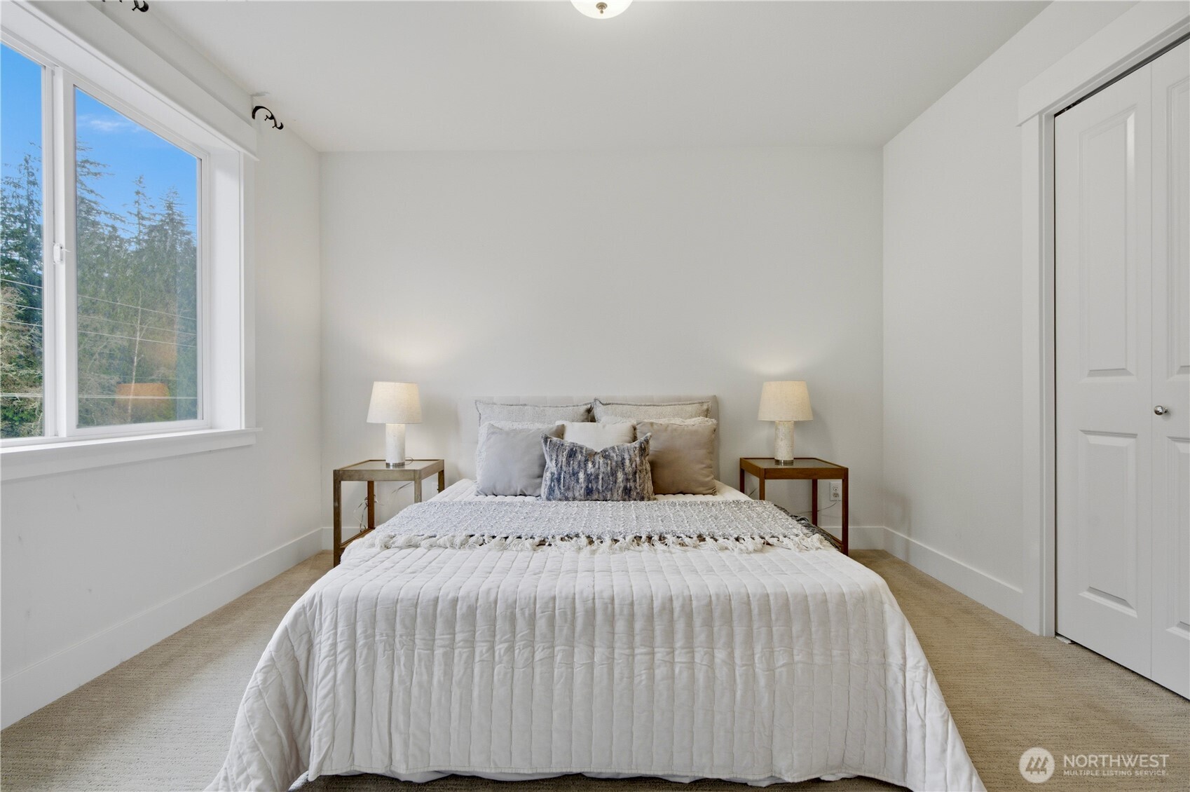 18615 46th Avenue Southeast Bothell, WA 98012 - Photo 26 of 37 a bedroom with a bed and window