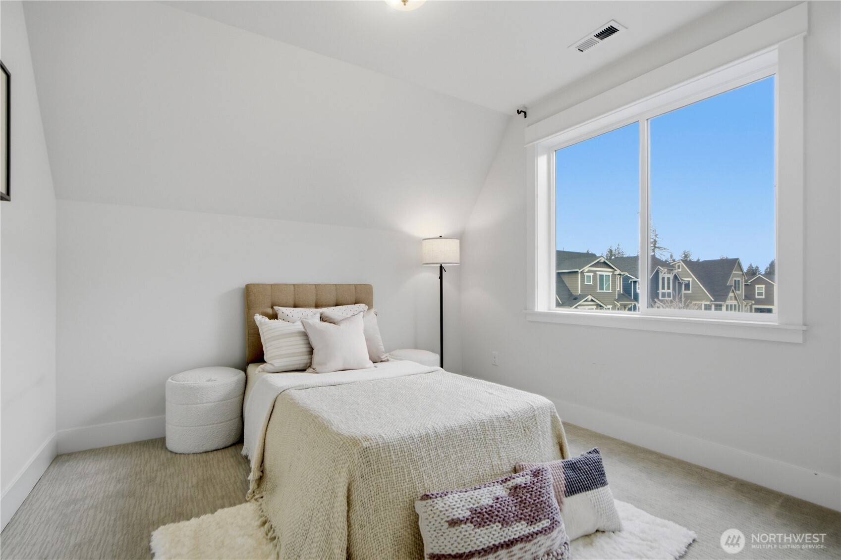 18615 46th Avenue Southeast Bothell, WA 98012 - Photo 27 of 37 a bedroom with a bed and window