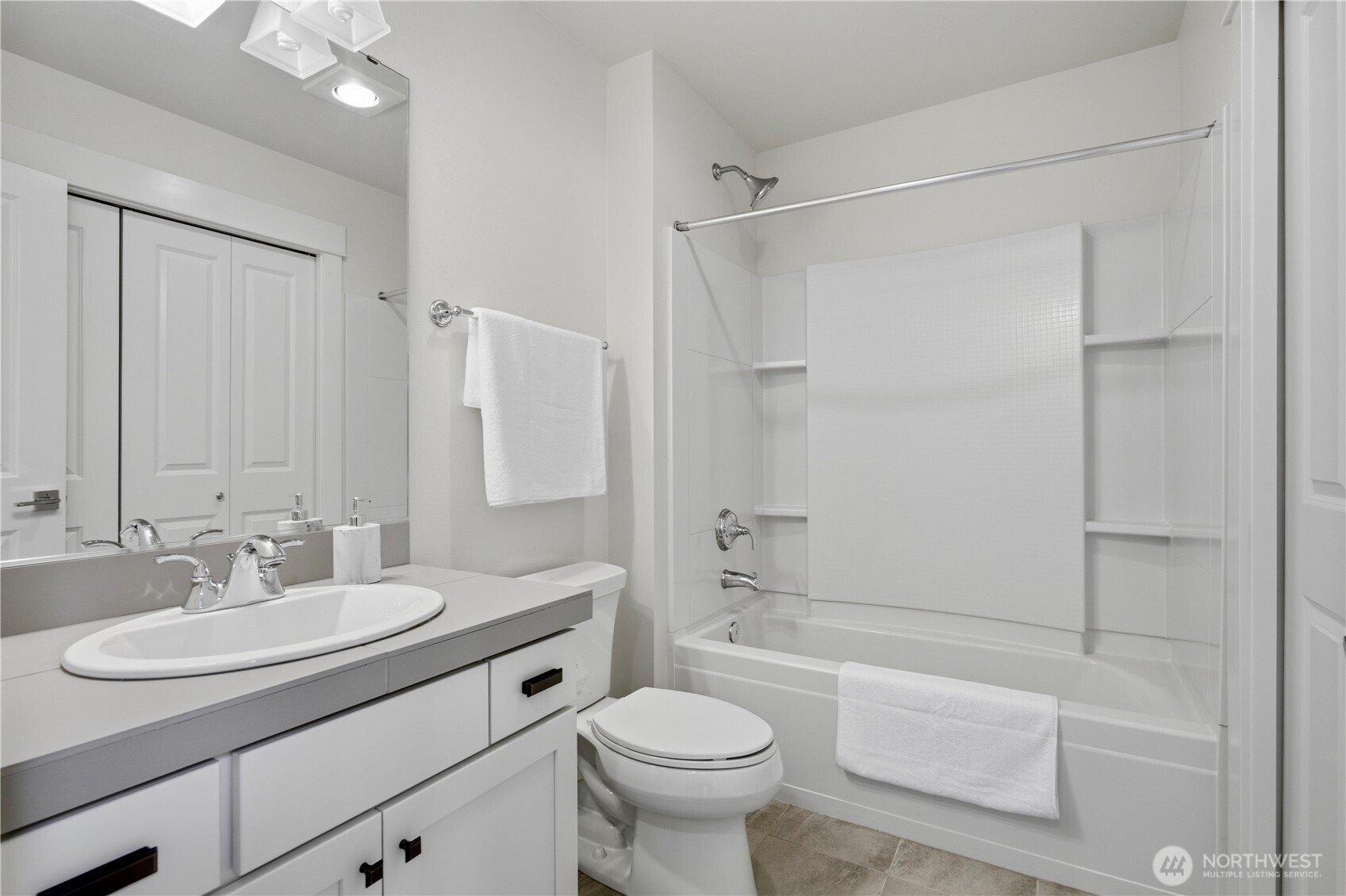 18615 46th Avenue Southeast Bothell, WA 98012 - Photo 28 of 37 a bathroom with a sink toilet and shower