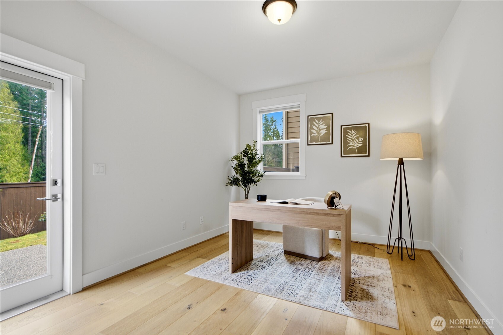 18615 46th Avenue Southeast Bothell, WA 98012 - Photo 3 of 37 a room with table and chair