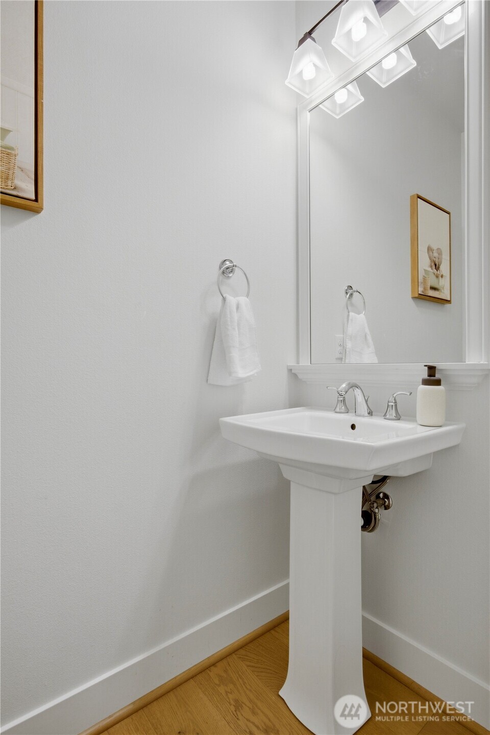 18615 46th Avenue Southeast Bothell, WA 98012 - Photo 8 of 37 a bathroom with a sink a mirror and vanity