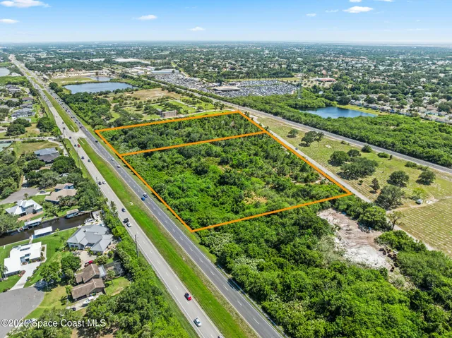 a view of swimming pool from a balcony