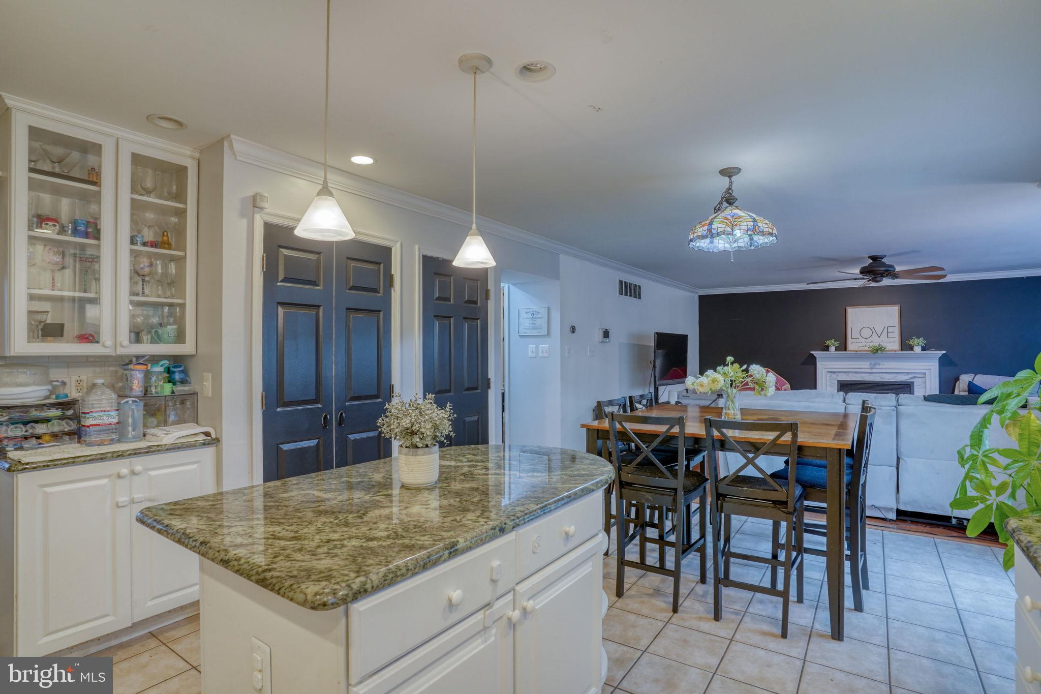 12 Bancroft Road New Castle, DE 19720 - Photo 12 of 38 a kitchen with a table and chairs