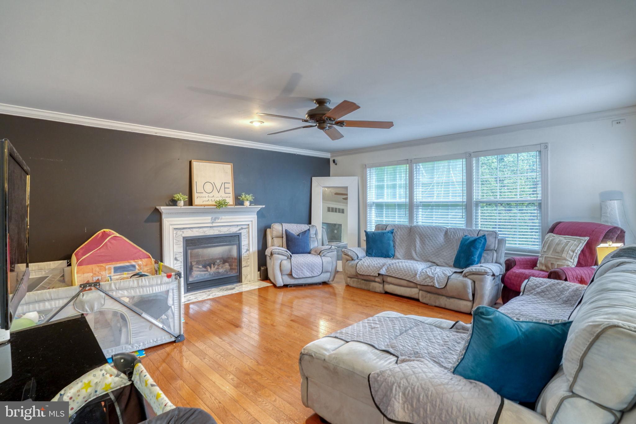 12 Bancroft Road New Castle, DE 19720 - Photo 18 of 38 a living room with furniture or fireplace and a table