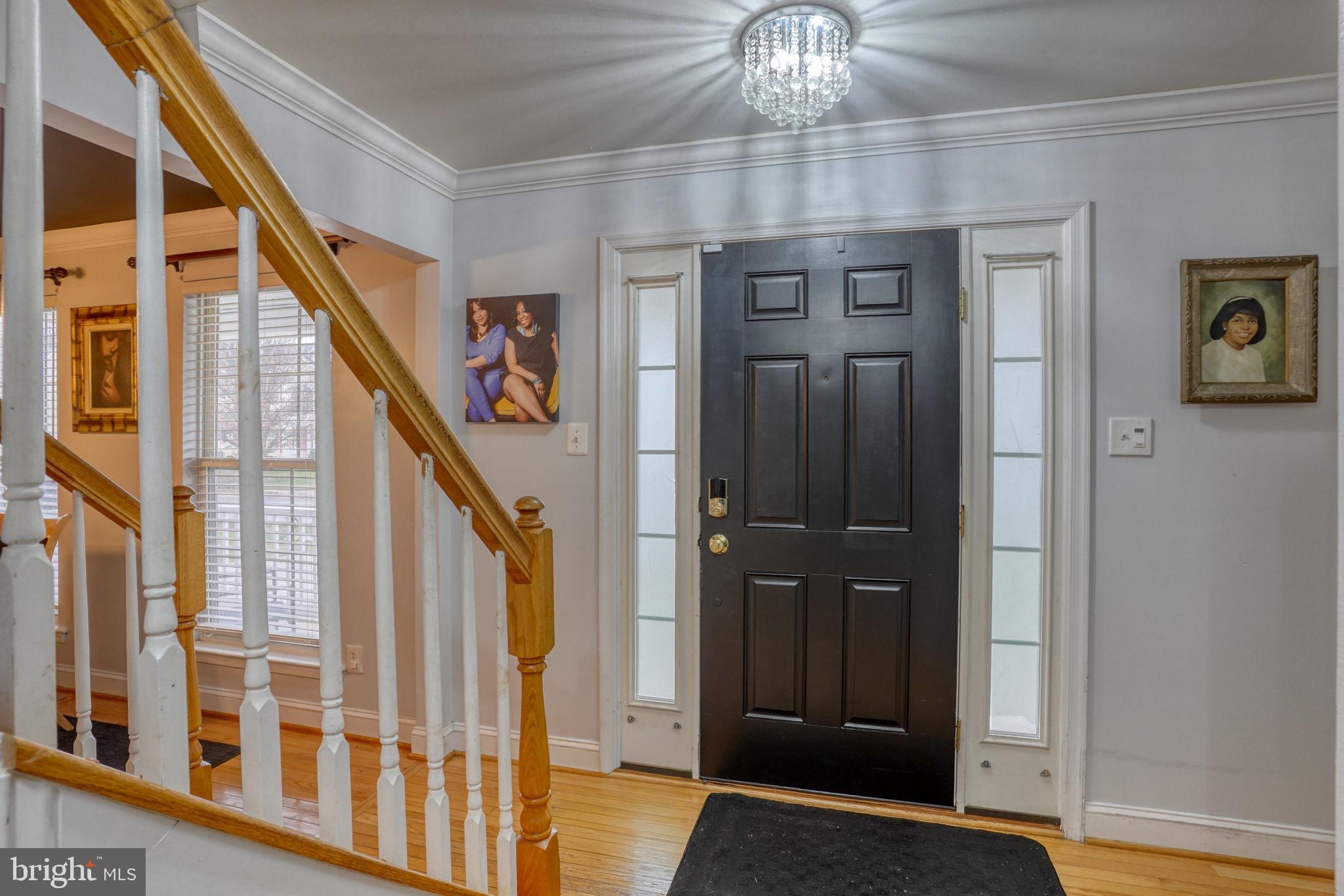 12 Bancroft Road New Castle, DE 19720 - Photo 5 of 38 a view of an entryway with staircase