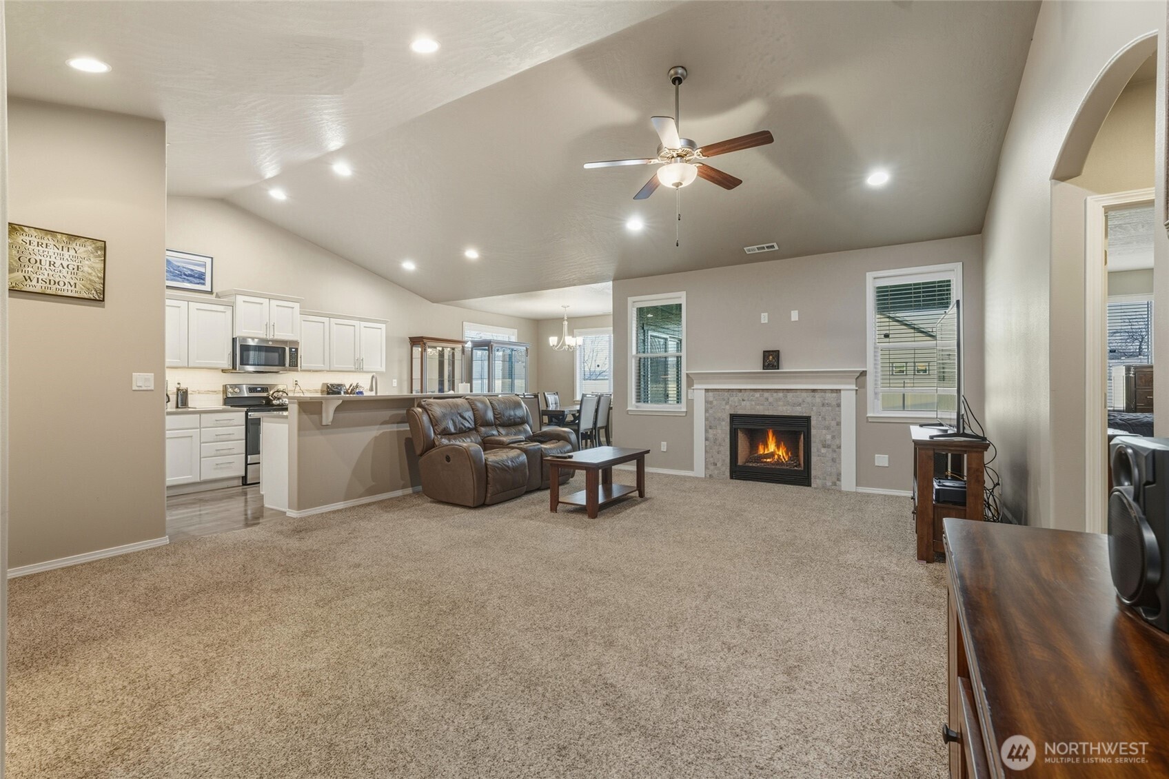 1397 Caprio Loop Walla Walla, WA 99362 - Photo 17 of 40 a living room with furniture and a fireplace
