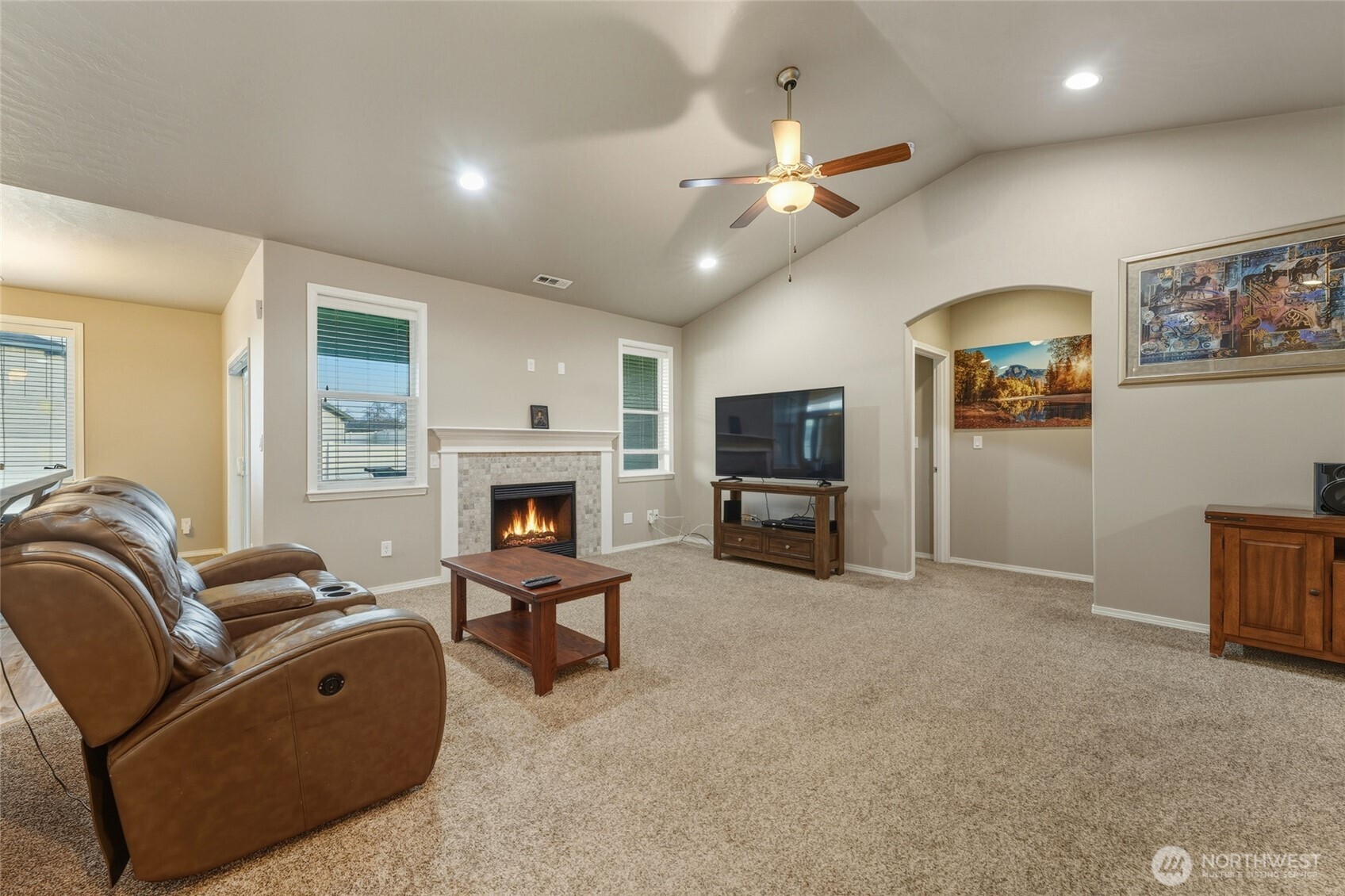 1397 Caprio Loop Walla Walla, WA 99362 - Photo 19 of 40 a living room with furniture and a fireplace