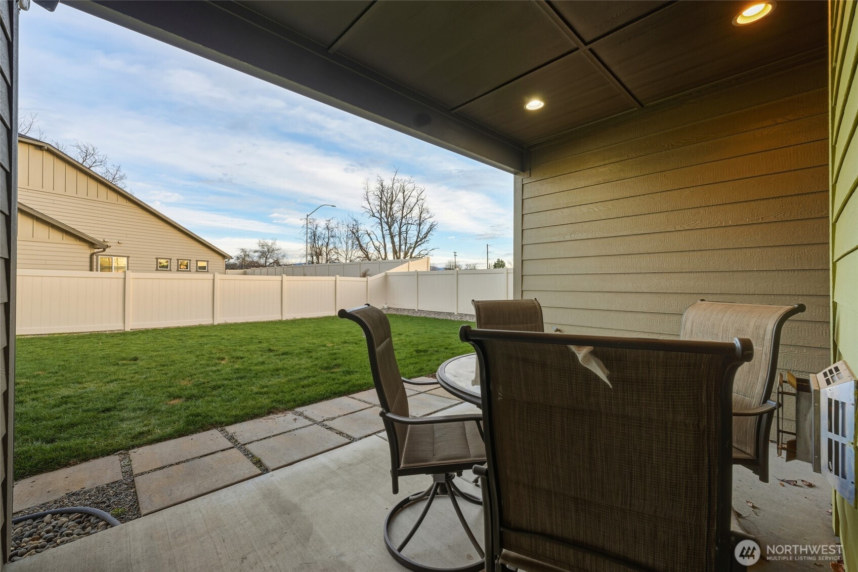 1397 Caprio Loop Walla Walla, WA 99362 - Photo 24 of 40 a view of backyard with seating and green space