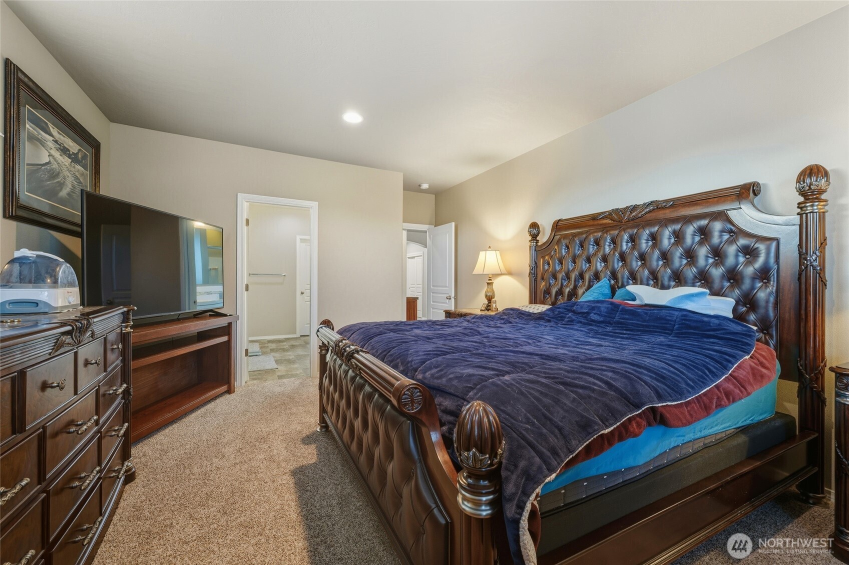 1397 Caprio Loop Walla Walla, WA 99362 - Photo 30 of 40 a bedroom with a bed and furniture