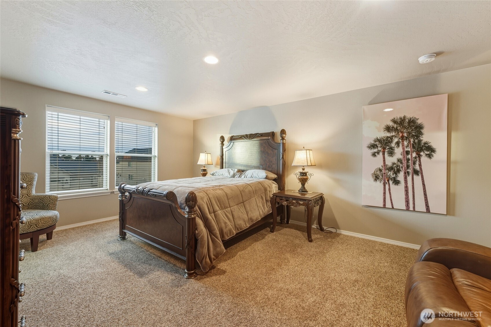 1397 Caprio Loop Walla Walla, WA 99362 - Photo 37 of 40 a bedroom with a bed and glass window