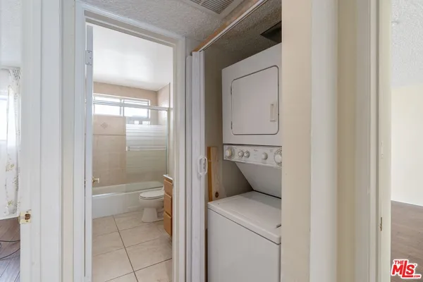 a bathroom with a toilet and a sink