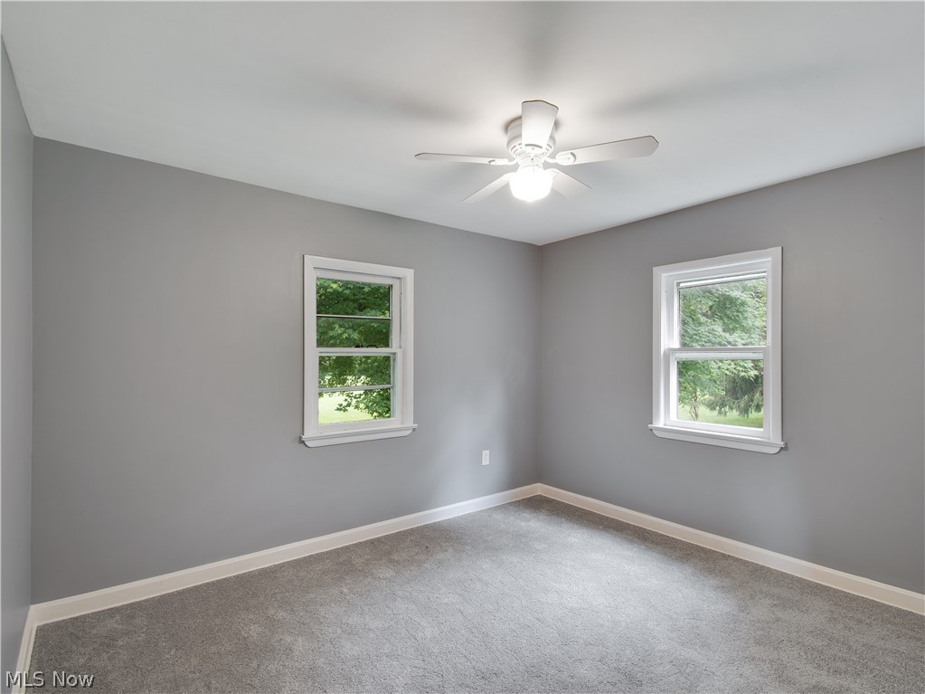 8356 South Cleveland Massillon Road Clinton, OH 44216 - Photo 25 of 30 SECOND BEDROOM WITH FRESH PAINT AND CARPET