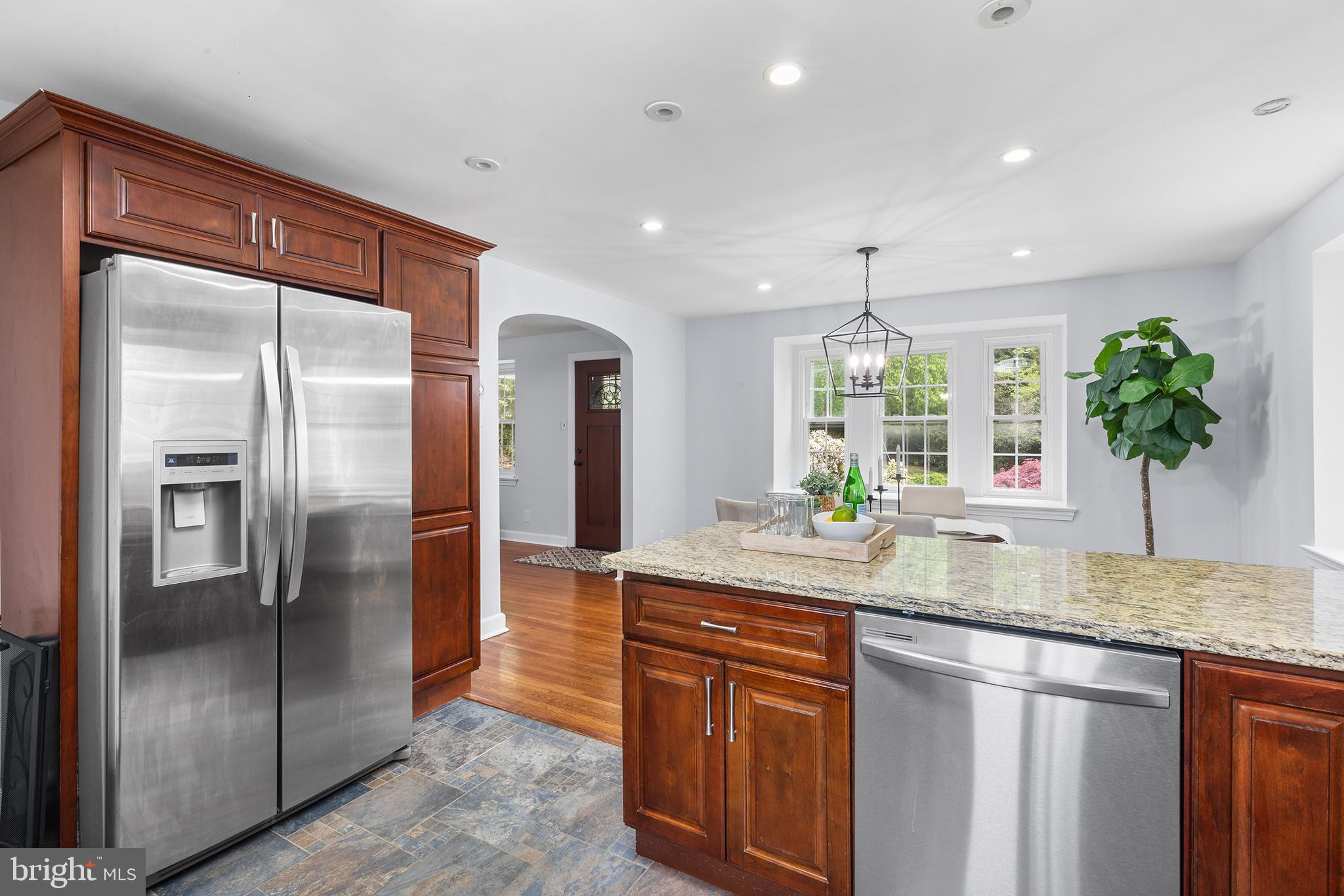 112 Rolling Road Bala Cynwyd, PA 19004 - Photo 11 of 39 a kitchen with stainless steel appliances granite countertop a refrigerator and a sink