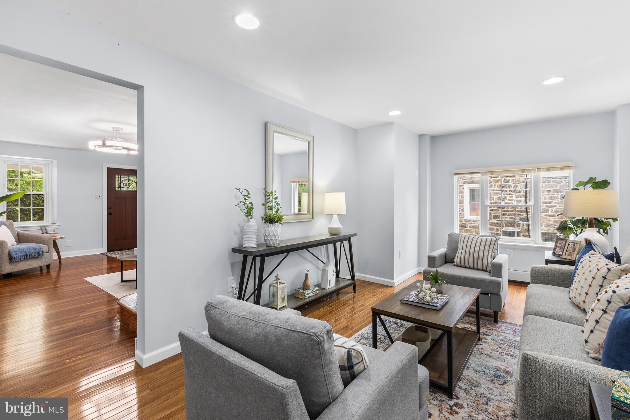 112 Rolling Road Bala Cynwyd, PA 19004 - Photo 13 of 39 a living room with furniture and a wooden floor