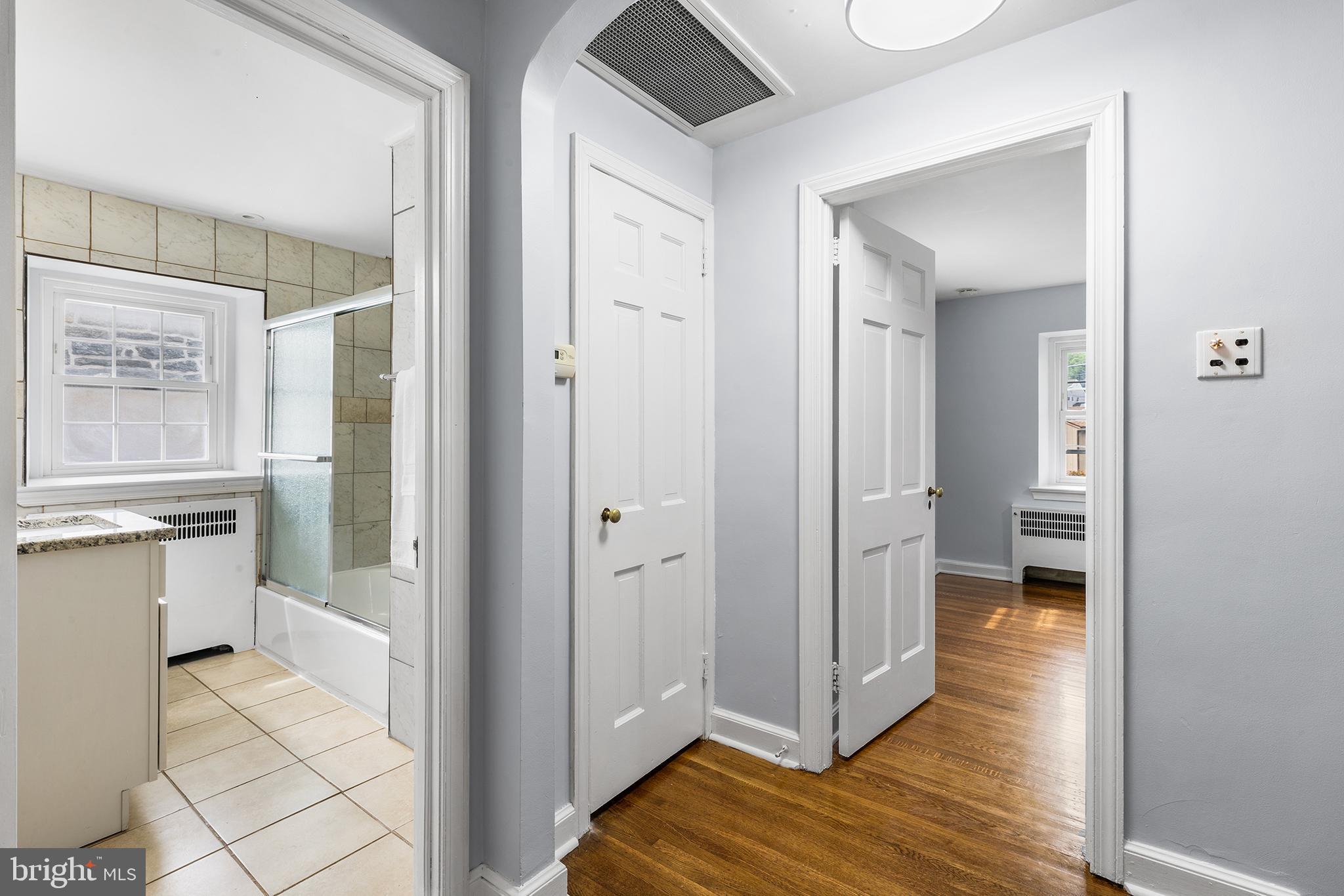 112 Rolling Road Bala Cynwyd, PA 19004 - Photo 16 of 39 a bathroom with a sink and a mirror
