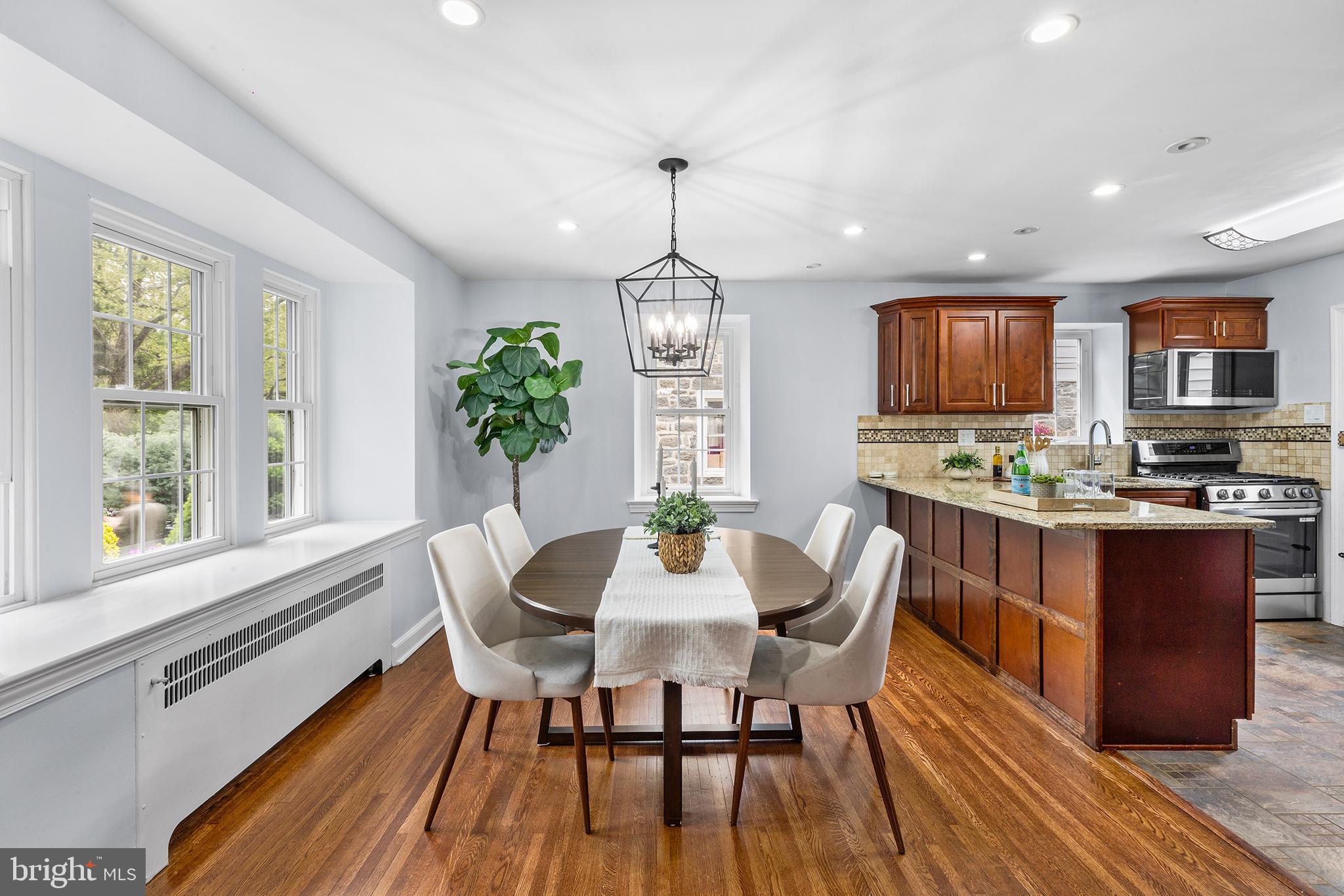 112 Rolling Road Bala Cynwyd, PA 19004 - Photo 6 of 39 a view of a dining room with furniture window and wooden floor