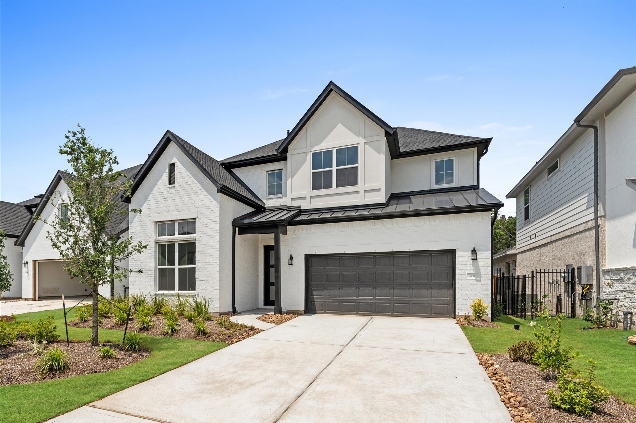 8218 Sherman Pk Trail Spring, TX 77389 - Photo 2 of 28 a front view of a house with yard
