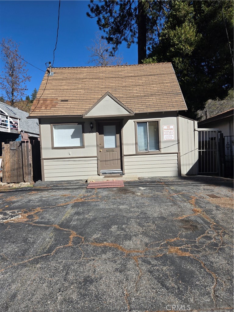 353 Highway 138 Crestline, CA 92325 - Photo 1 of 12 a view of a house with a backyard