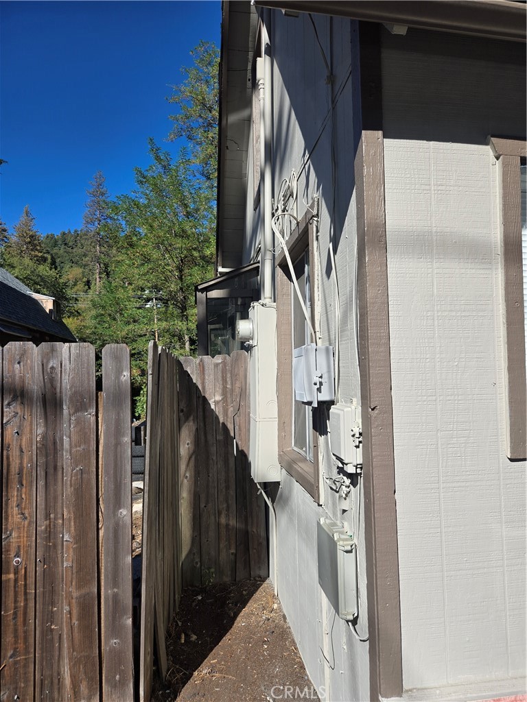 353 Highway 138 Crestline, CA 92325 - Photo 2 of 12 a view of balcony with wooden floor and fence