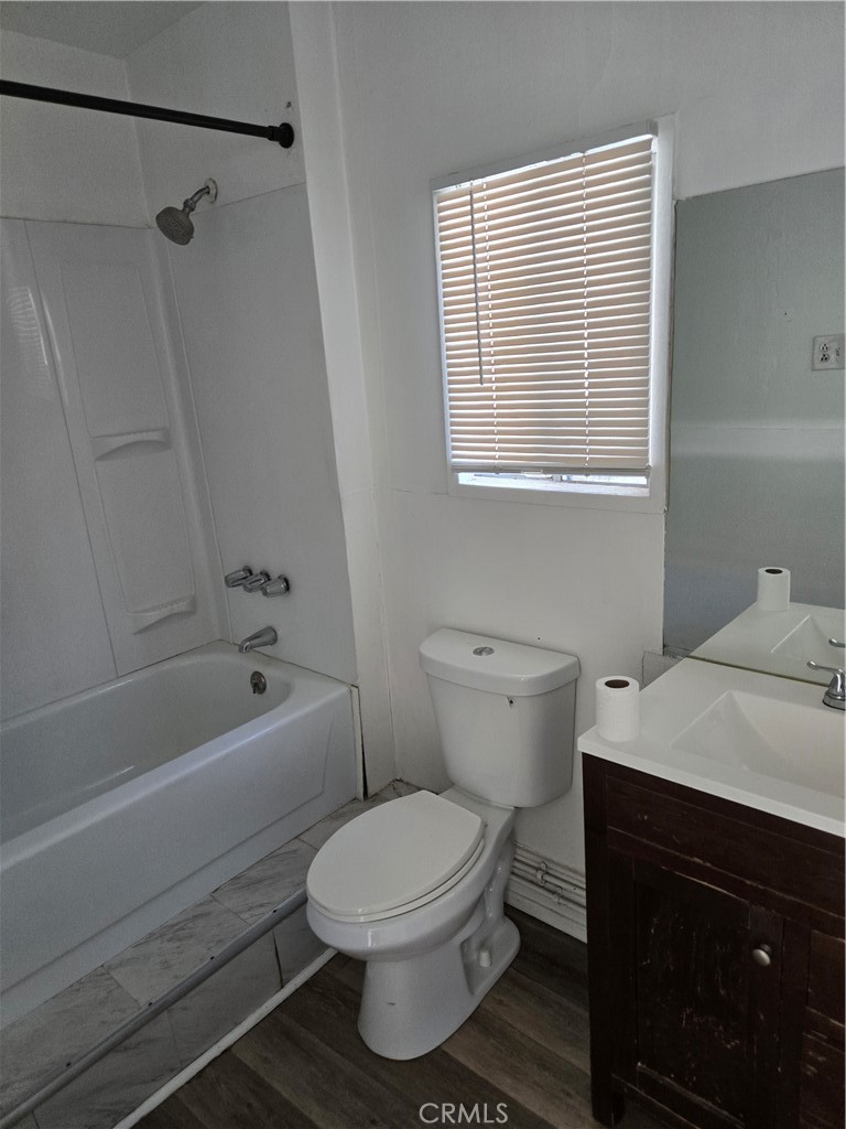 353 Highway 138 Crestline, CA 92325 - Photo 6 of 12 a bathroom with a sink a toilet and shower