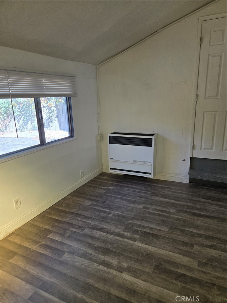 353 Highway 138 Crestline, CA 92325 - Photo 9 of 12 a view of a room with wooden floor and cabinet