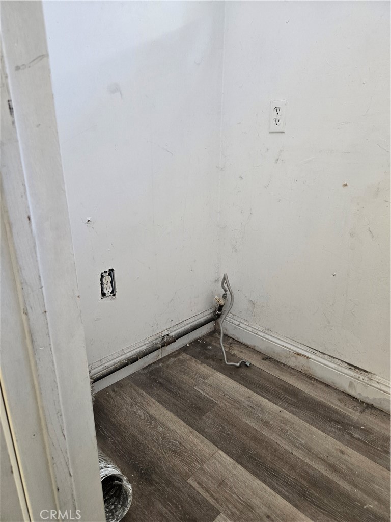 353 Highway 138 Crestline, CA 92325 - Photo 10 of 12 a room with a wooden floor and cabinets