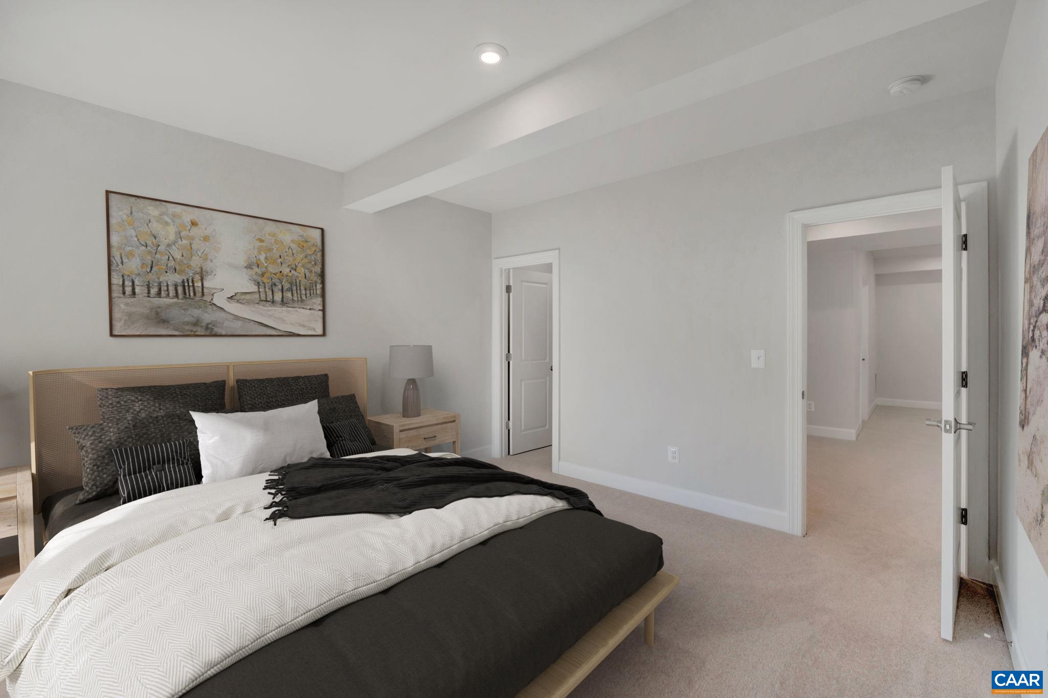 2981 Rambling Brk Lane Crozet, VA 22932 - Photo 12 of 37 a bedroom with a bed and a painting on the wall