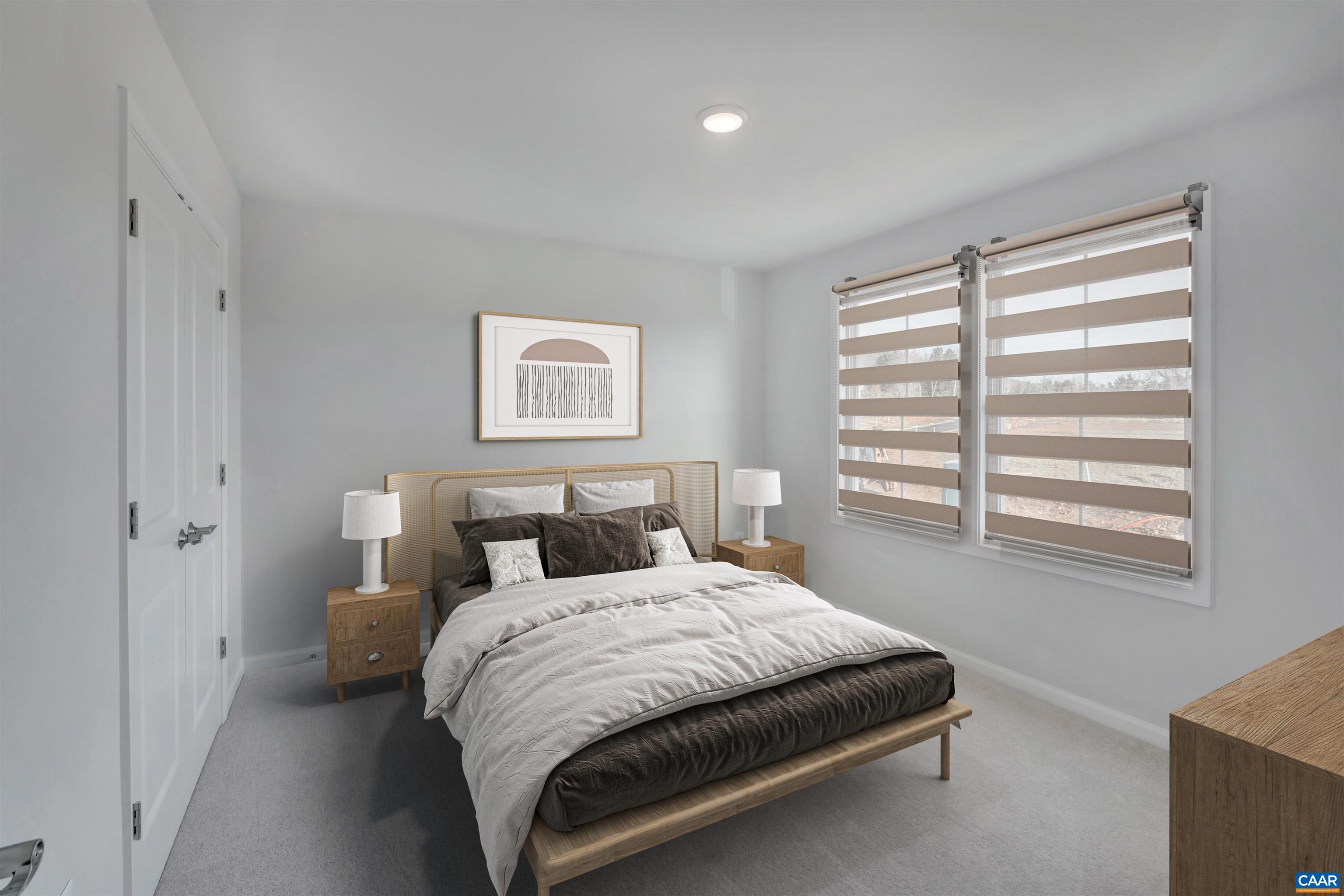 2981 Rambling Brk Lane Crozet, VA 22932 - Photo 16 of 37 a bedroom with a bed and a window