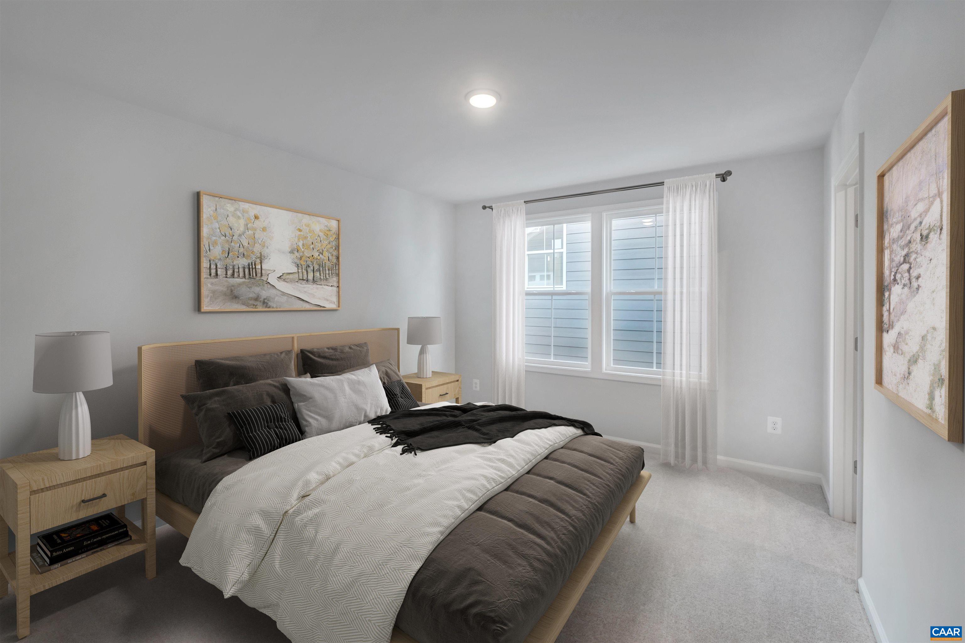 2981 Rambling Brk Lane Crozet, VA 22932 - Photo 17 of 37 a bedroom with a bed and a window