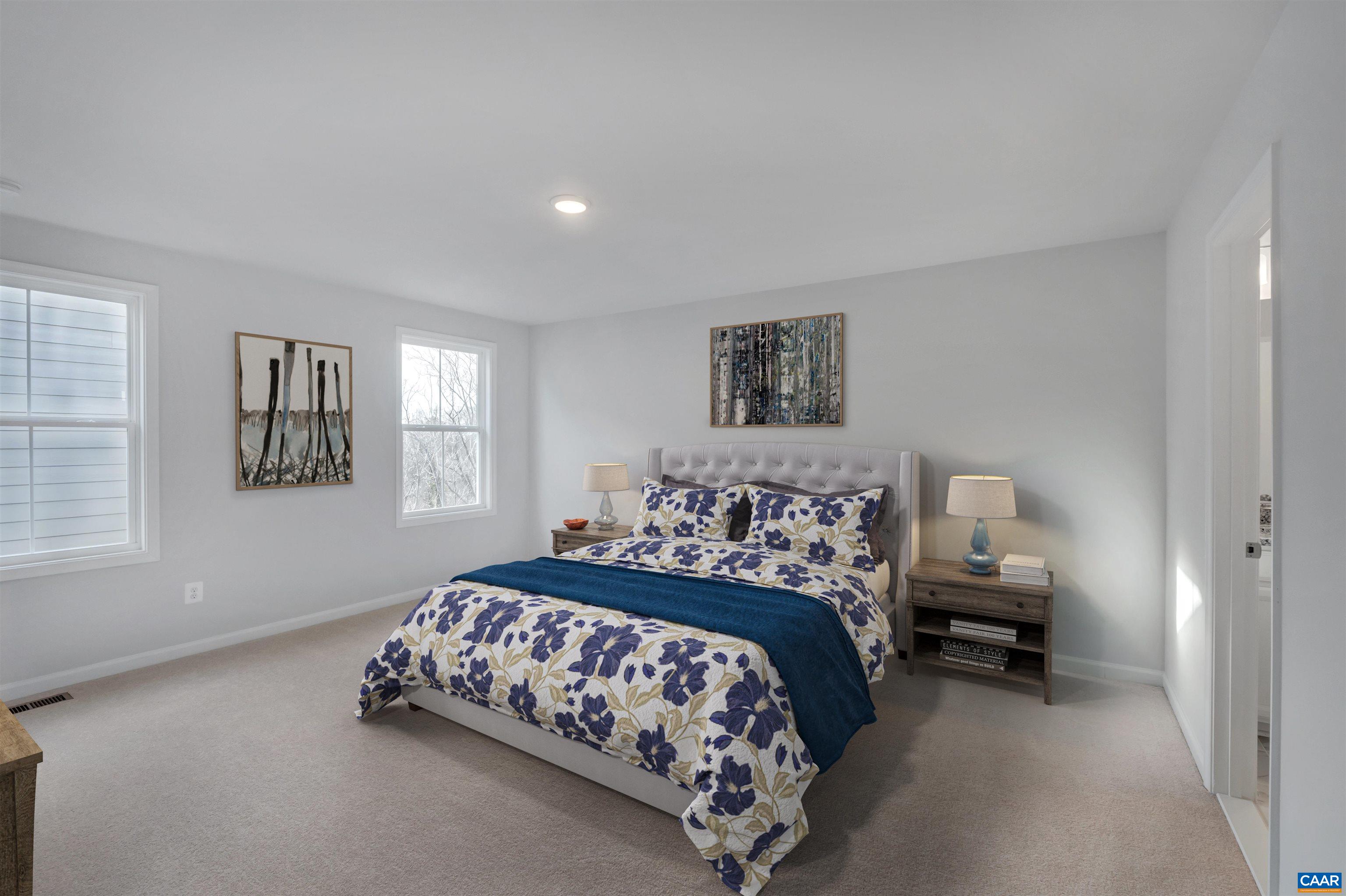 2981 Rambling Brk Lane Crozet, VA 22932 - Photo 19 of 37 a bedroom with a bed and a window