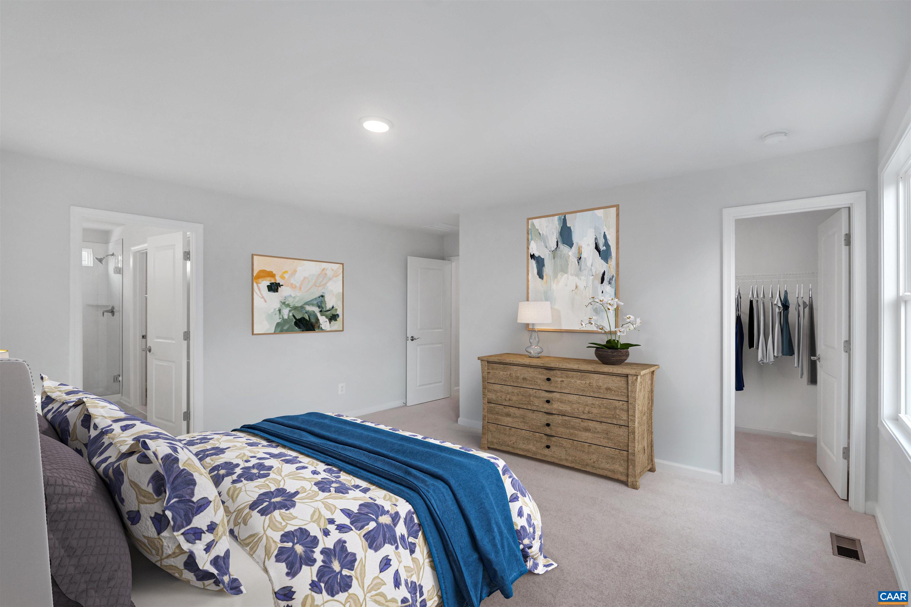 2981 Rambling Brk Lane Crozet, VA 22932 - Photo 20 of 37 a bedroom with a bed and a cabinets