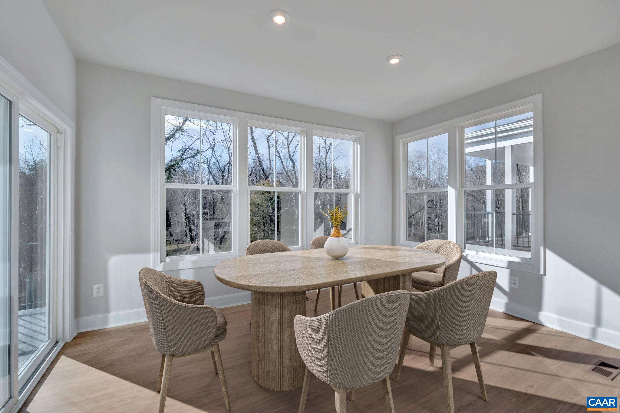 2981 Rambling Brk Lane Crozet, VA 22932 - Photo 2 of 37 a view of a dining room with furniture window and outside view