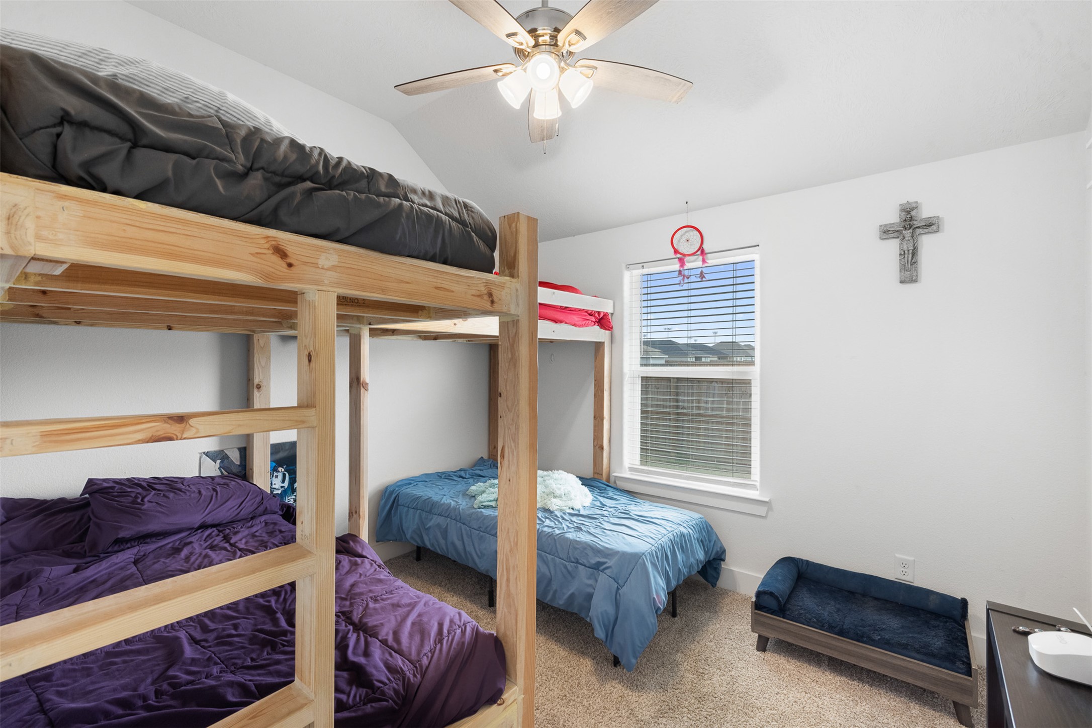 149 Windmill Road Somerville, TX 77879 - Photo 13 of 31 a bedroom with furniture and a window