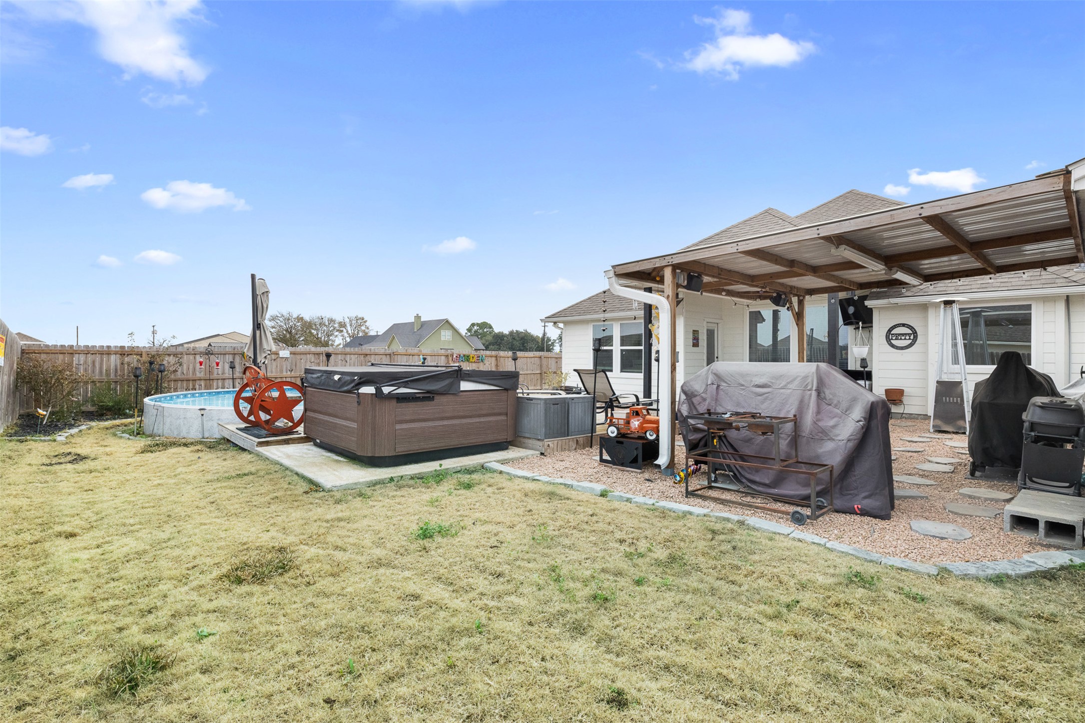 149 Windmill Road Somerville, TX 77879 - Photo 5 of 31 a view of a backyard with sitting area