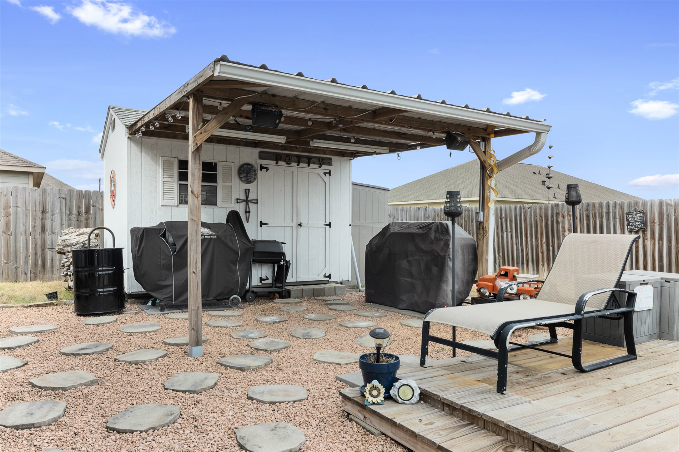 149 Windmill Road Somerville, TX 77879 - Photo 7 of 31 a front view of a house with patio