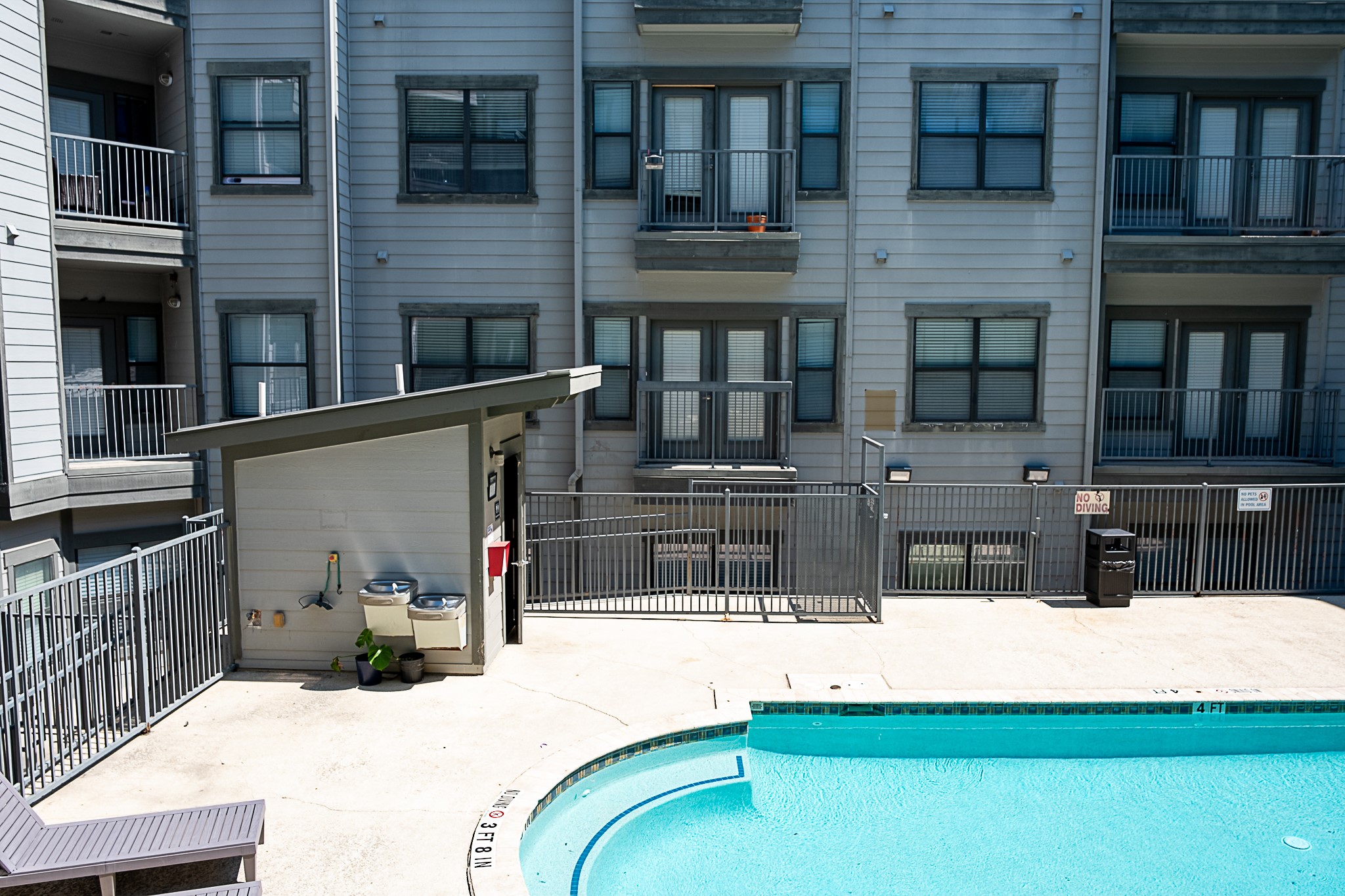 2502 Leon Street, Unit 309 Austin, TX 78705 - Photo 18 of 19 a view of a balcony with two chairs
