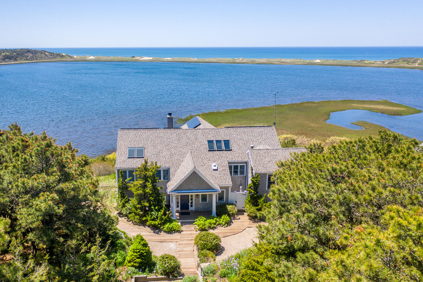 1035 Chequessett Neck Road Wellfleet, MA 02667 - Photo 2 of 86 aerial view of a house with a lake view