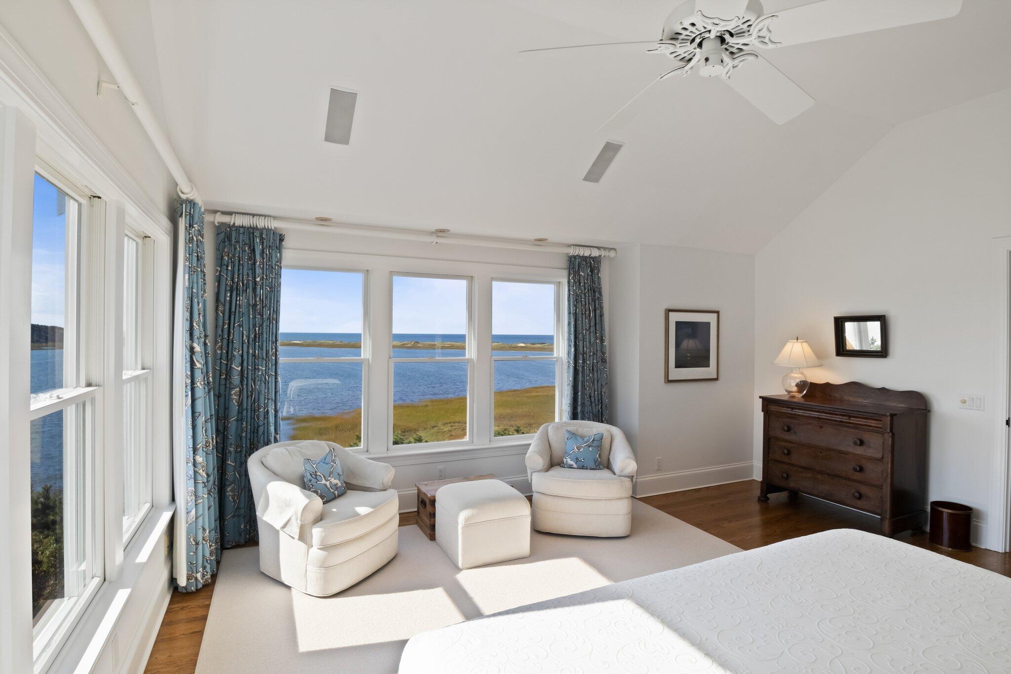 1035 Chequessett Neck Road Wellfleet, MA 02667 - Photo 29 of 86 a living room with furniture and a large window
