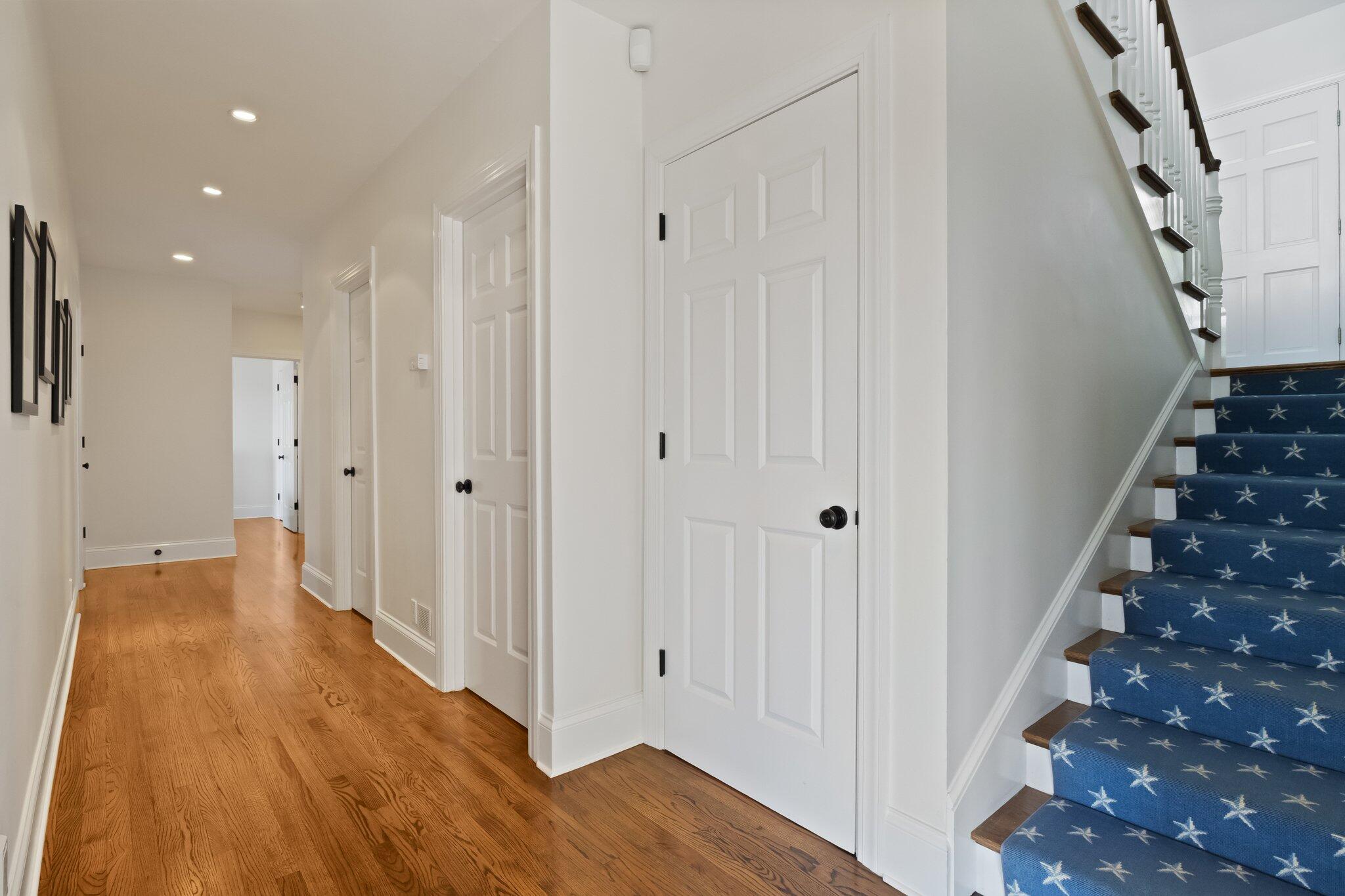 1035 Chequessett Neck Road Wellfleet, MA 02667 - Photo 36 of 86 a view of a hallway with wooden floor and stairs