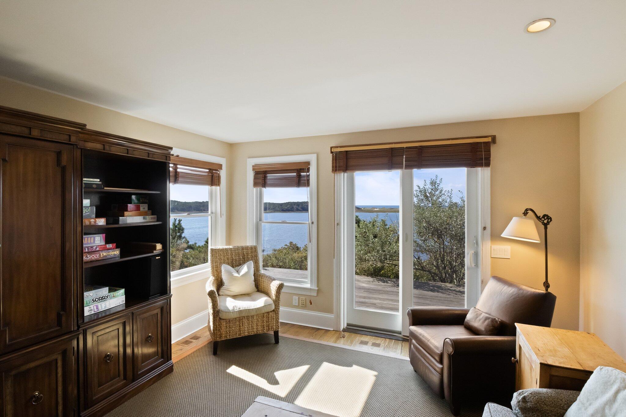 1035 Chequessett Neck Road Wellfleet, MA 02667 - Photo 39 of 86 a living room with furniture and a window
