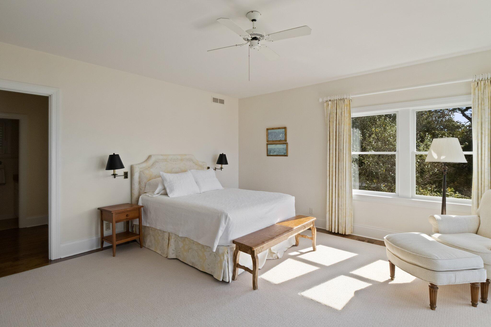 1035 Chequessett Neck Road Wellfleet, MA 02667 - Photo 42 of 86 a spacious bedroom with a bed and a window