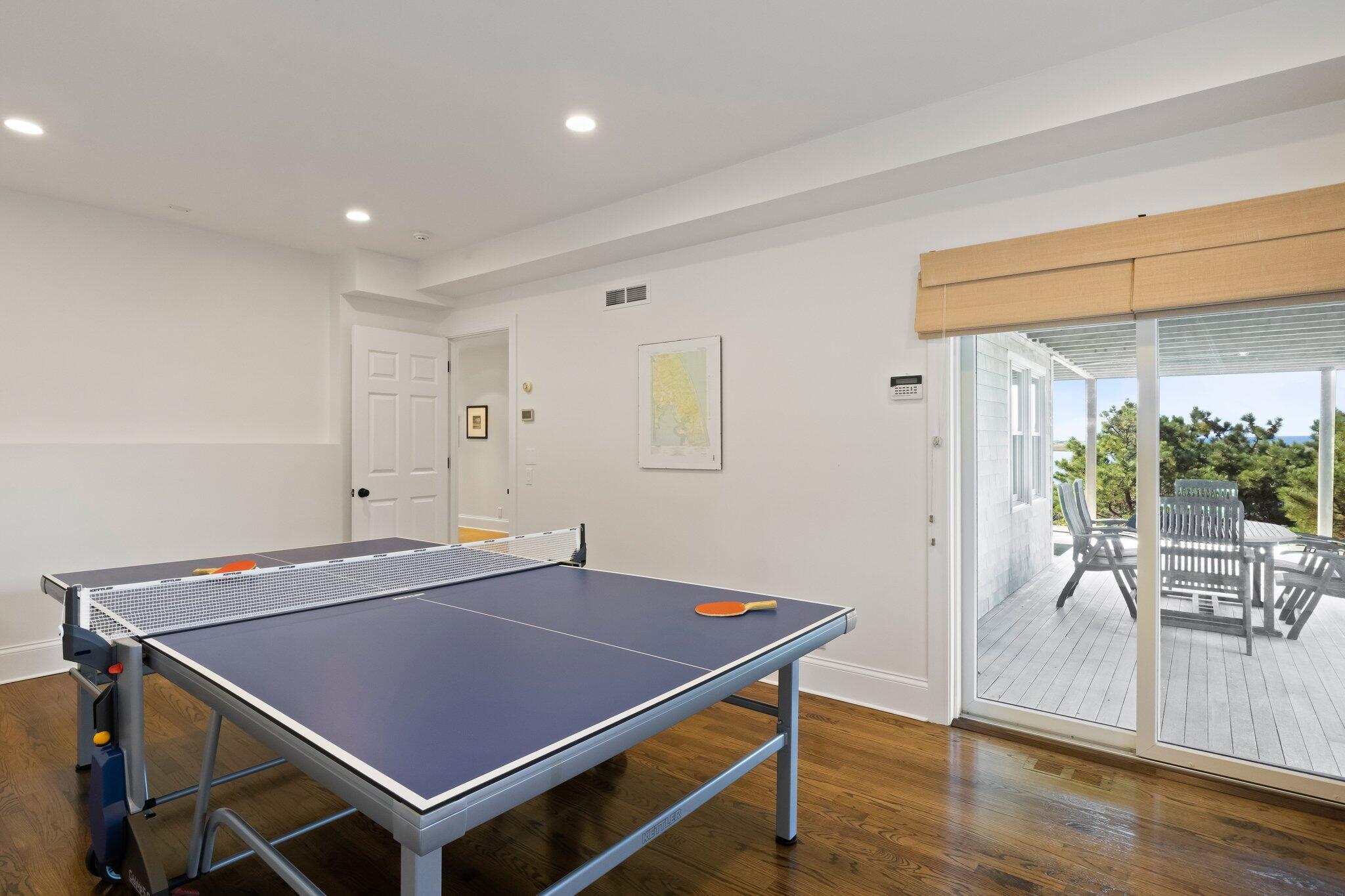 1035 Chequessett Neck Road Wellfleet, MA 02667 - Photo 53 of 86 a view of a room with furniture and wooden floor