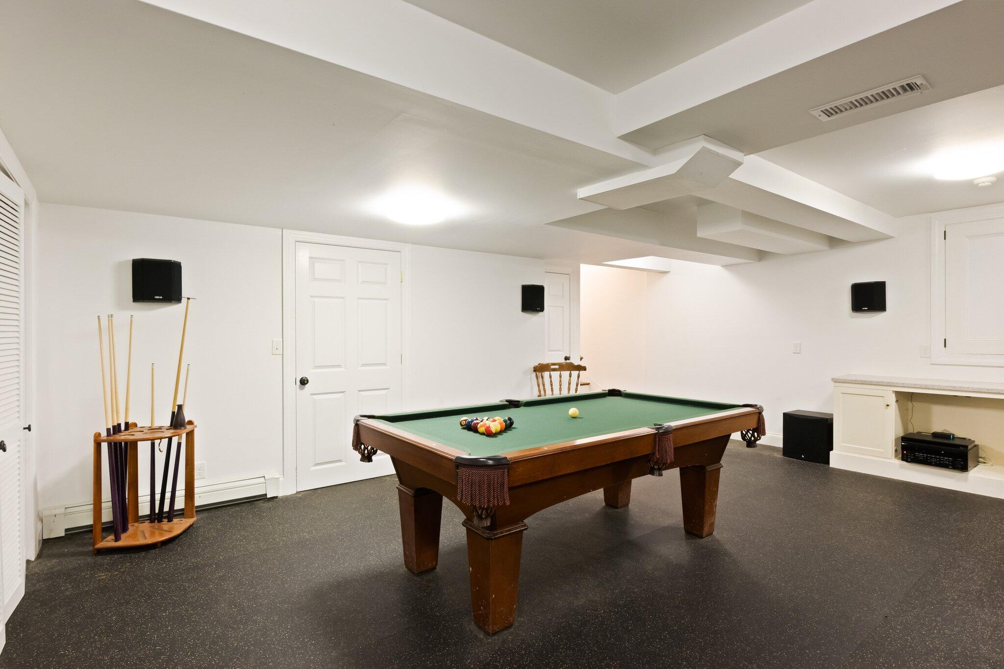1035 Chequessett Neck Road Wellfleet, MA 02667 - Photo 55 of 86 a room with furniture and air hockey table